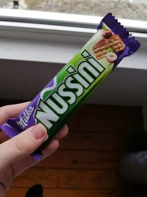 "Milka" 31,5гр Nussini шок.бат.мол.вафельный с Ореховым кремом 1уп*35шт Монделиз